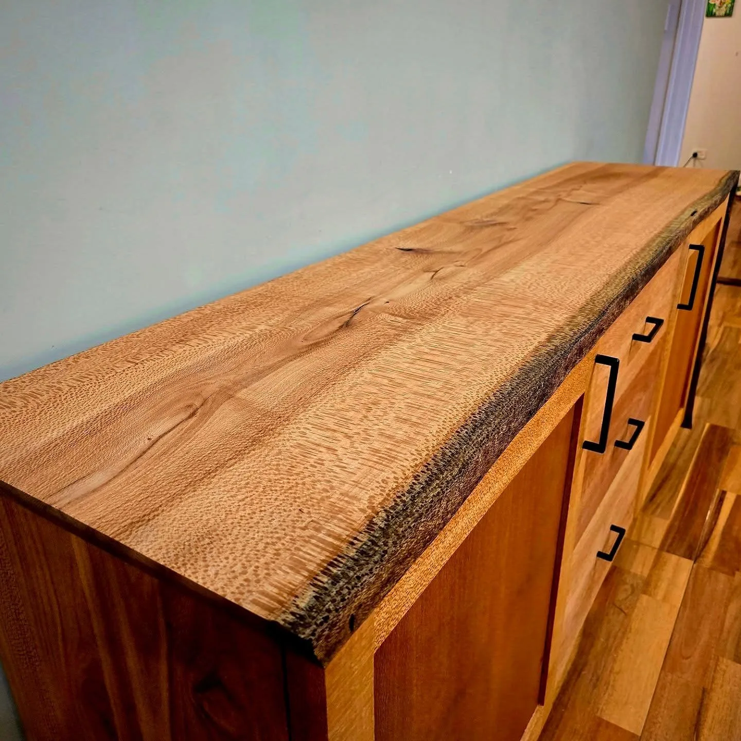 A handcrafted live-edge timber console table made by Grizzly Timber Works