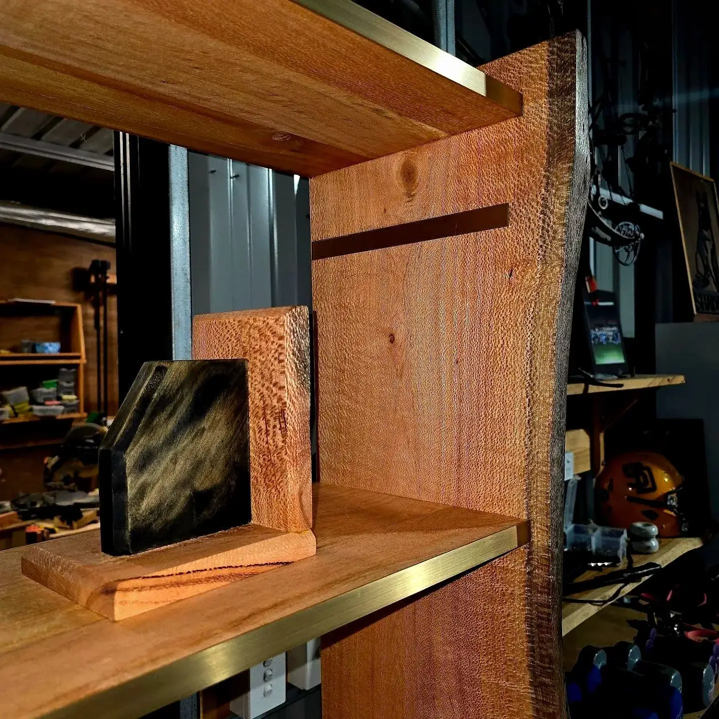 A floating timber shelf crafted from salvaged hardwood
